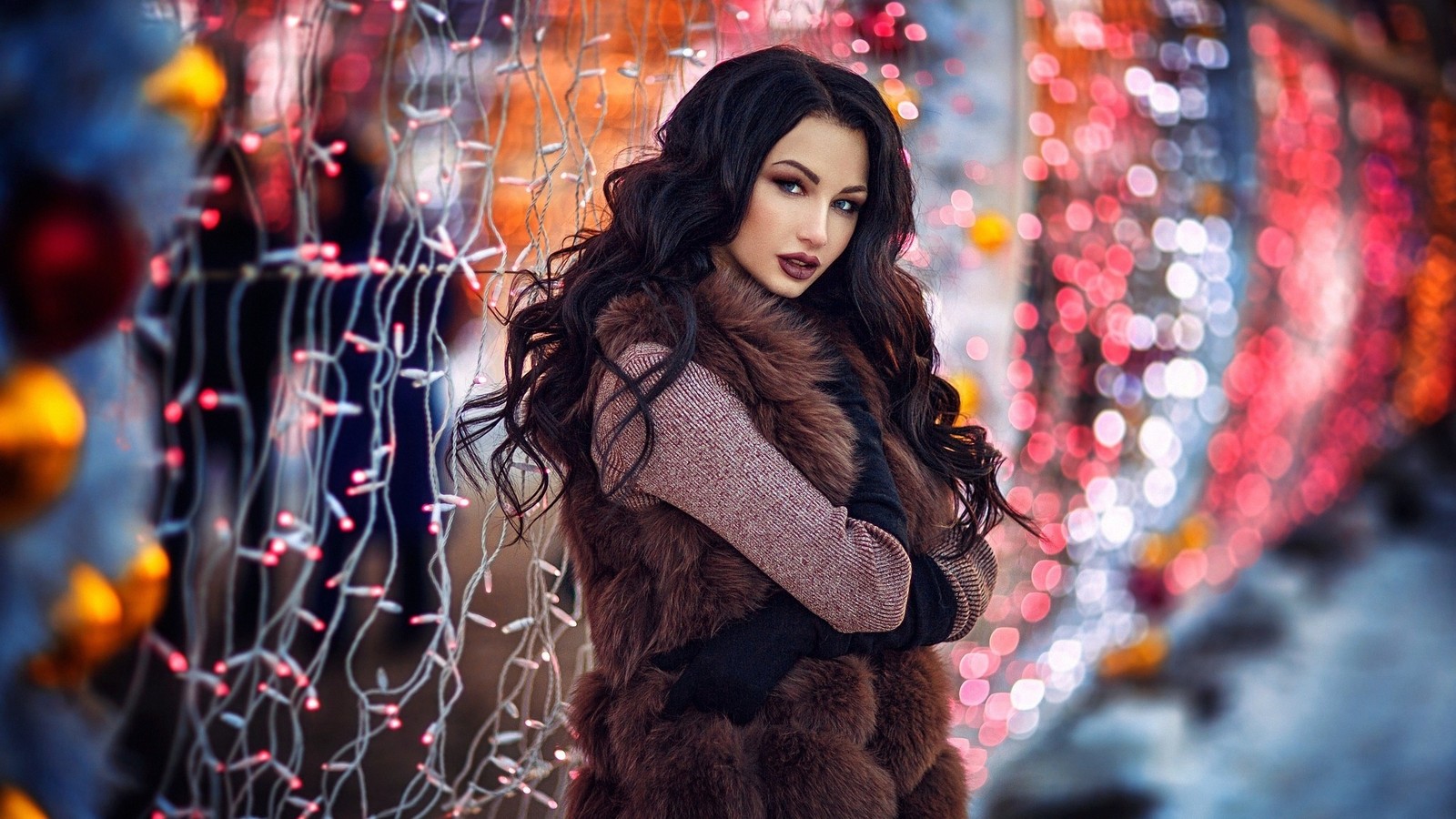 Arafed woman in a fur coat standing in front of a wall with christmas lights (long hair, fashion, girl, vogue, autumn)