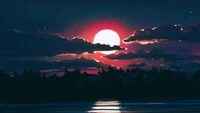 Moonlit Night Sky Over Serene Landscape