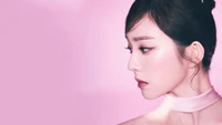 Irene's ethereal profile against a soft pink backdrop, exuding elegance and charm.