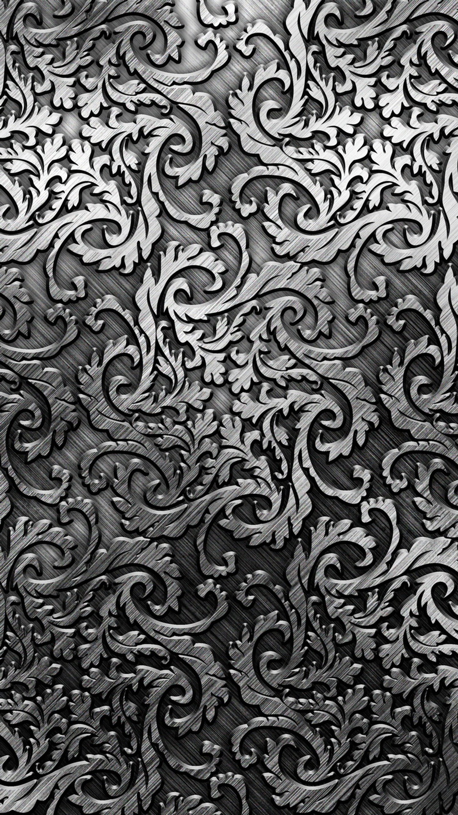 A close up of a metal surface with a pattern on it (abstract, landscape, love, nature, view)