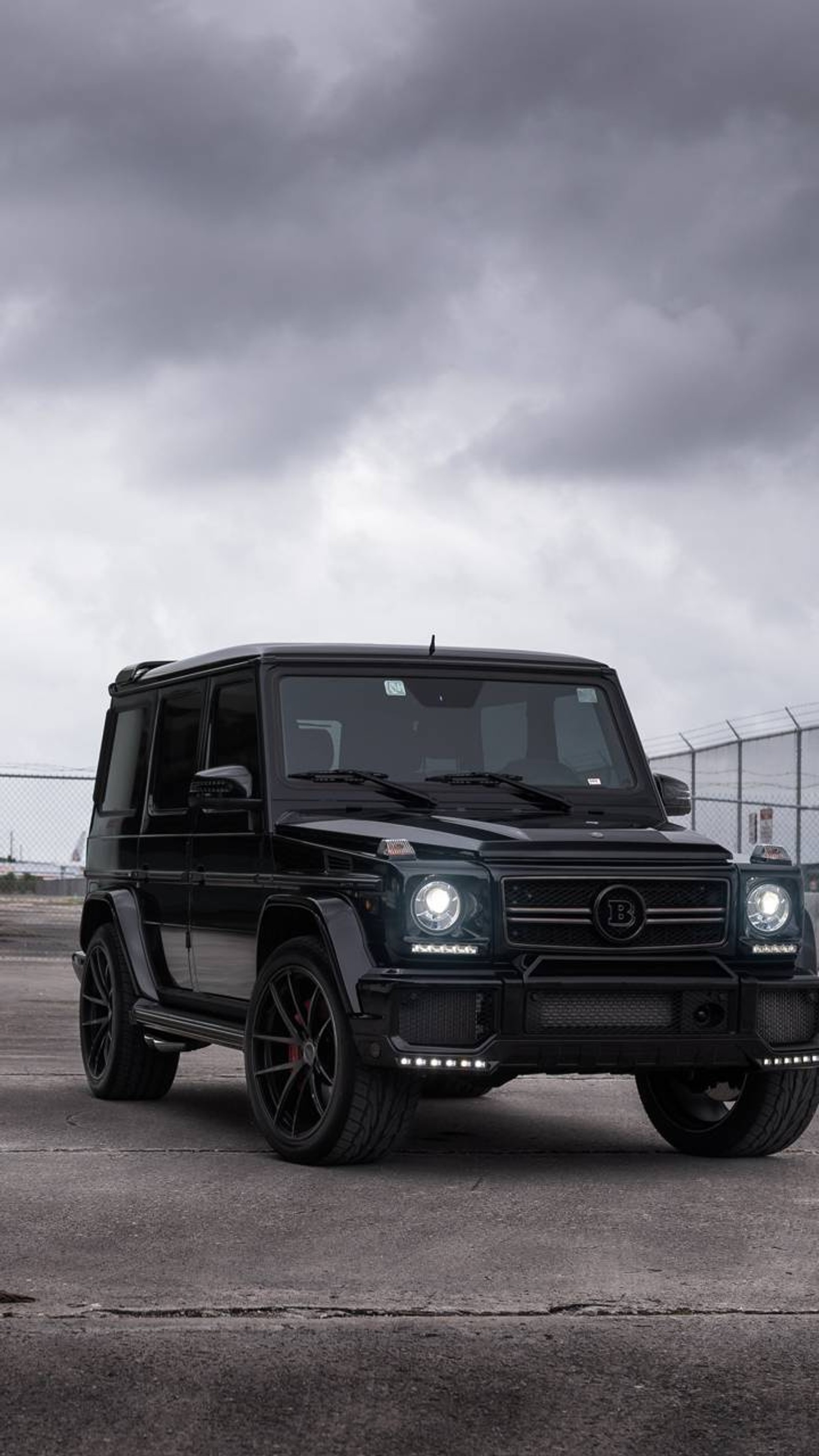 Arafed black mercedes g - class parked in a parking lot (black, car, class, g63, gwagon)