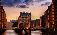 Evening Reflections of Medieval Architecture in a City Waterway