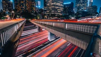 Dynamic Nightscape of Los Angeles: Urban Light Trails and Modern Architecture