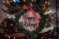 Happy Holidays Wreath on a Christmas Tree