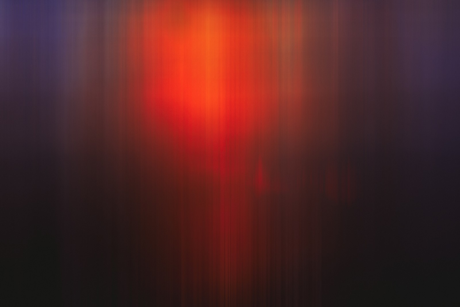 Blurred image of a red light in the middle of a dark room (vector graphics, red, black, blue, light)