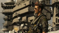 Personagem em Flight Gear em um porta-aviões de Top Gun: Maverick