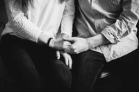 Intimate Black and White Portrait of Intertwined Hands