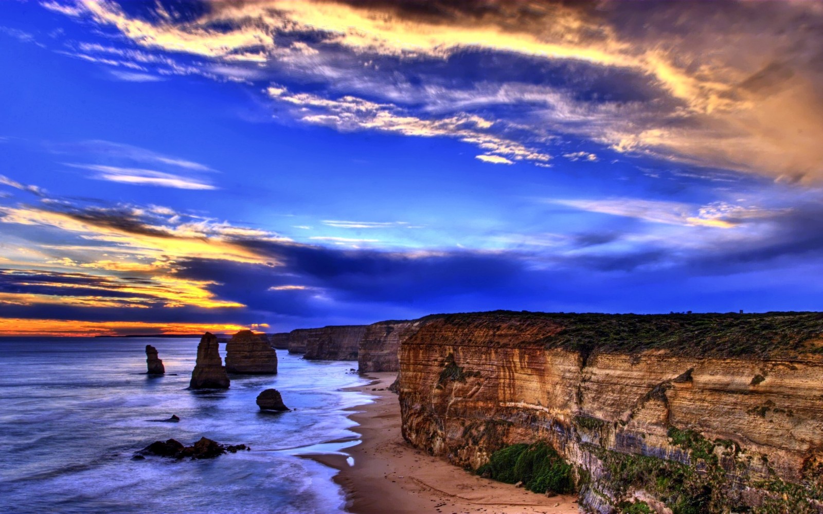 Sunset over the twelve apostless, great ocean road, australia (cloud, sea, cliff, coast, shore)