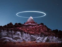 circle light, mountain peak, night, illuminated, 5k