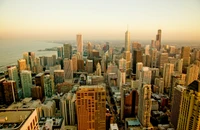 Coucher de soleil sur Chicago : Un paysage urbain captivant avec des gratte-ciel emblématiques et une skyline