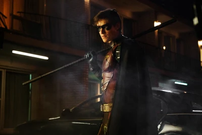 Nighttime Vigilante: Dick Grayson as Robin in a Dark Urban Adventure