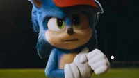 Sonic the Hedgehog in a tense moment, showcasing determination and readiness.