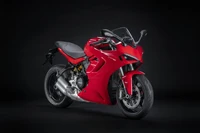 Ducati Supersport 950: Impactante moto deportiva roja sobre fondo oscuro, modelo 2021, resolución 5K.