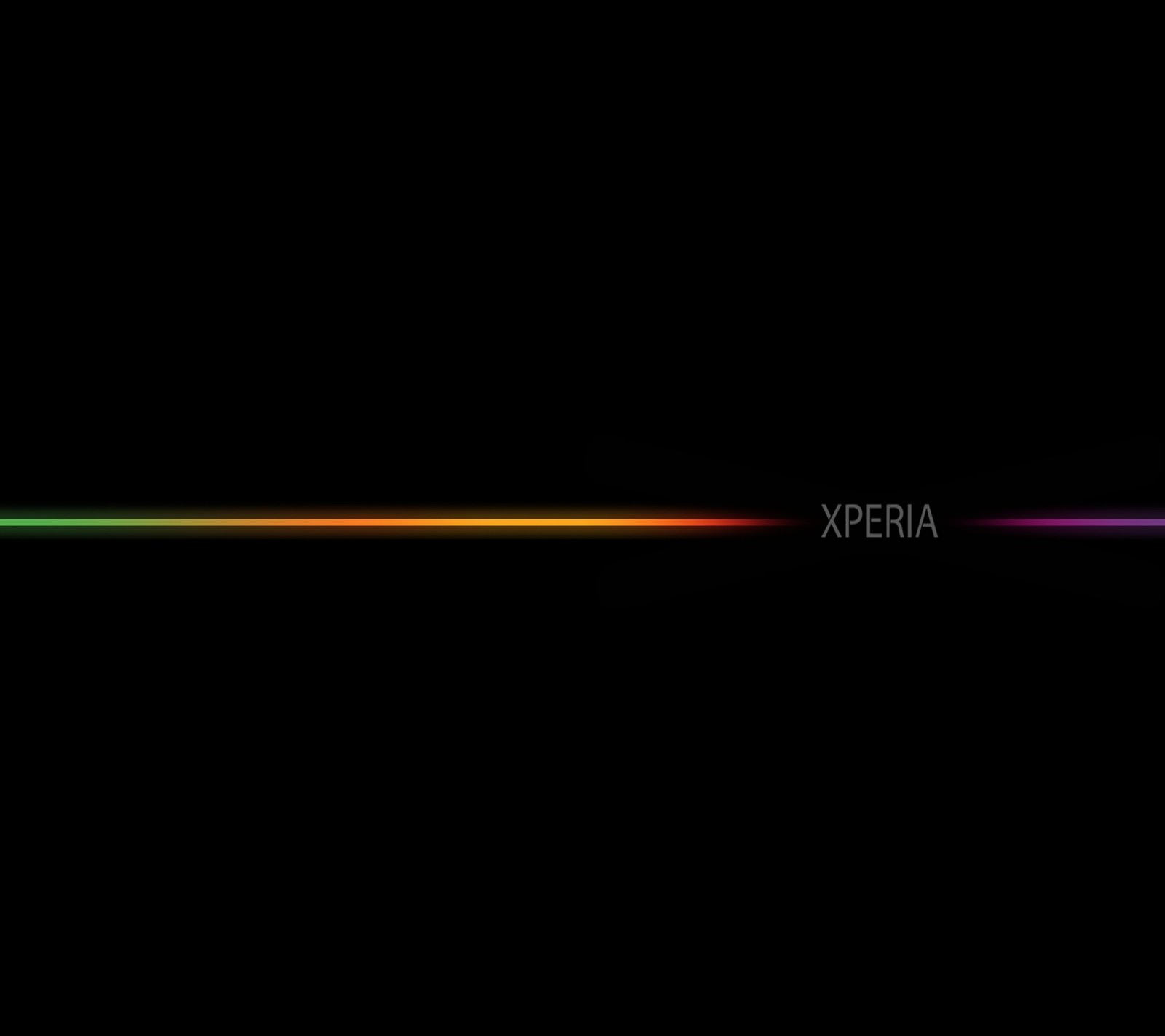 A close up of a black background with a rainbow light (logos, marcas, sprigamelvirus, xperia)