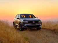 Prototipo Acura MDX 2020 al atardecer en un mirador escénico