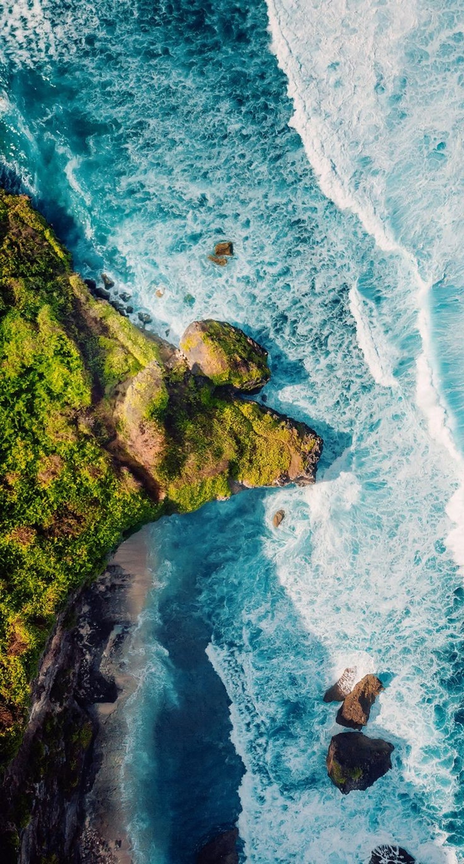 Aerial view of a beach with a body of water and a green island (blue, eyad, fall, falls, remix)