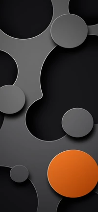 Colorful Orange Circle Amidst Black and Grey Graphic Pattern