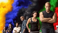 Fast & Furious 9: Actiongeladener Filmplakat mit Hauptcharakteren vor einem bunten Hintergrund