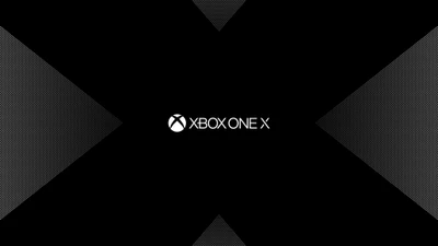 Monochromes Xbox One X-Logo auf schwarzem gemustertem Hintergrund