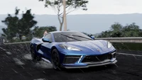 Courses dynamiques dans Project Cars 3 : Voiture de sport bleue sur une piste pluvieuse