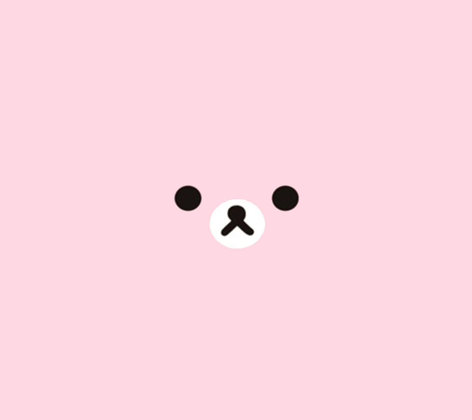 A close up of a pink wall with a bear face (bear, pink)