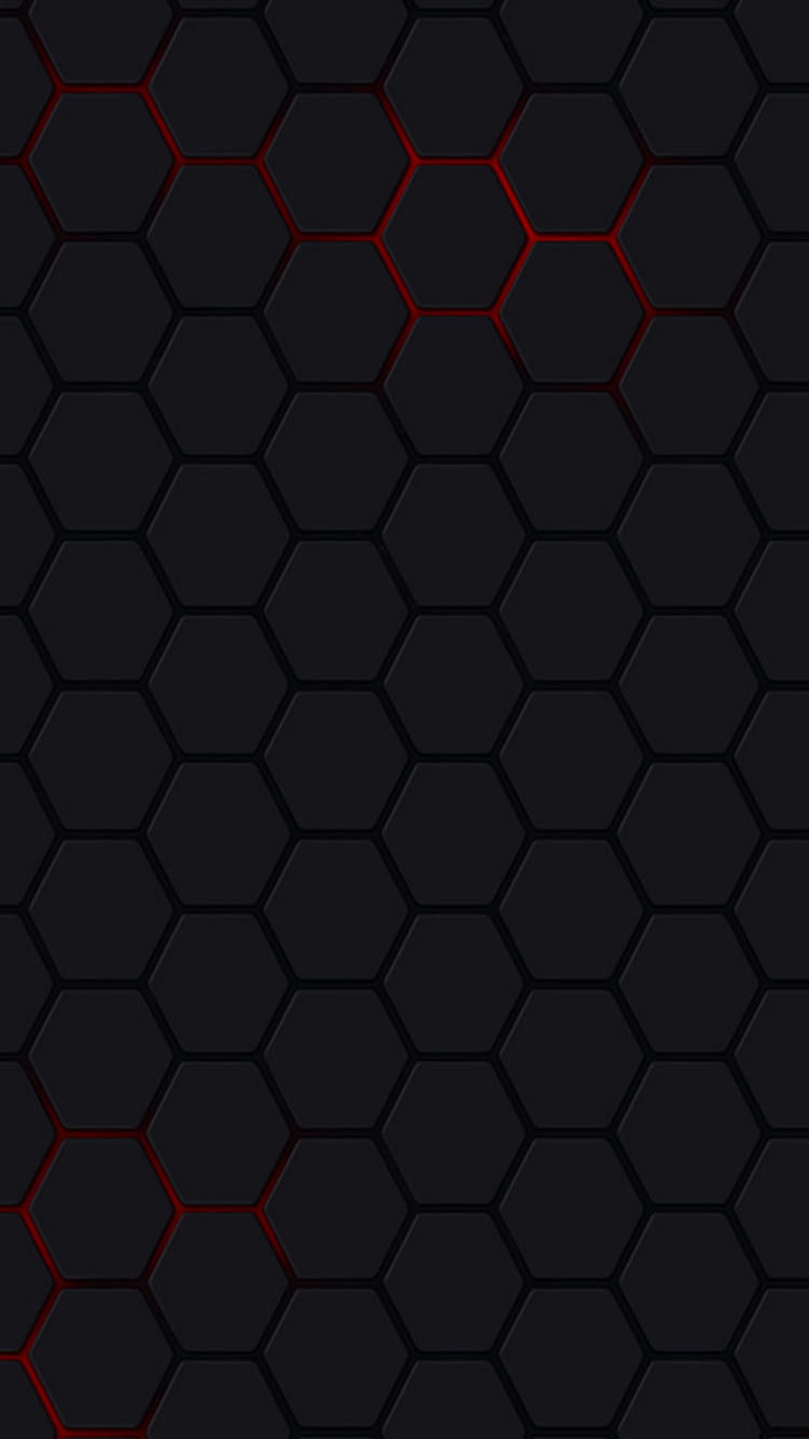 A close up of a black and red hexagonal pattern (pattern, wall)