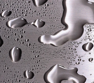 Raindrops on a Silver Metal Surface