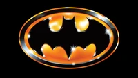 Logotipo iluminado do Batman em fundo preto