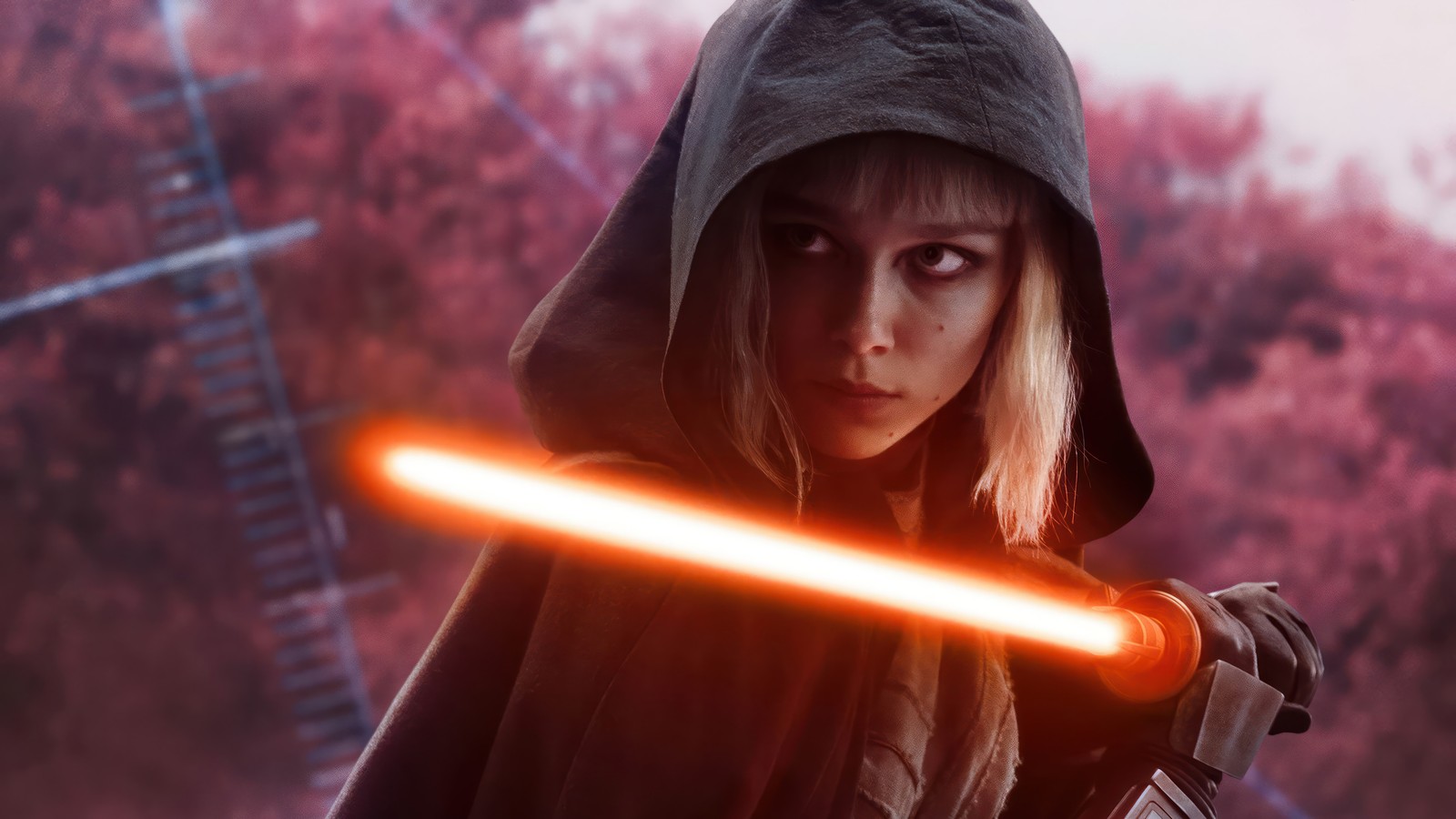 Une femme en sweat à capuche tenant un sabre laser (shin hati, sabre laser, lightsaber, série ahsoka, ahsoka series)