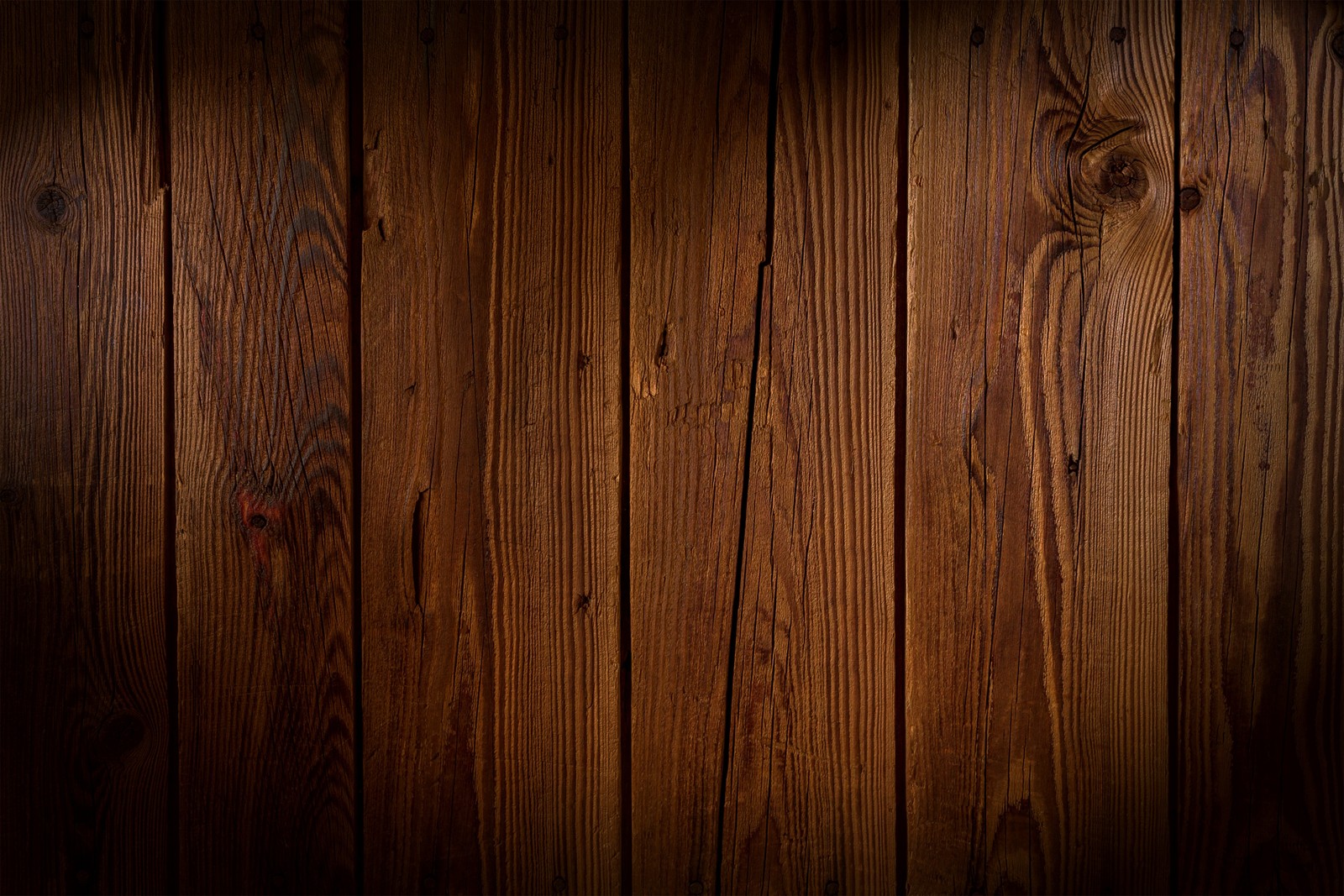 A close up of a wooden wall with a light shining on it (wooden background, wooden planks, 5k, photography, 4k wallpaper)