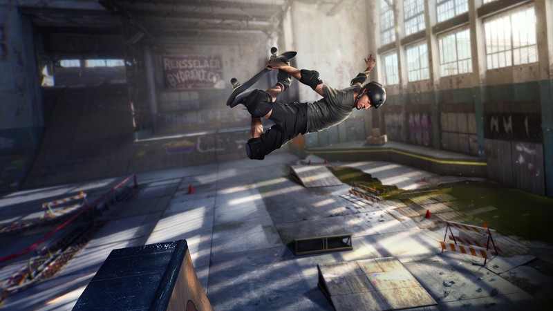 Арафед скейтбордист в черной футболке делает трюк в здании (tony hawks pro skater 12, tony hawks pro skater 1 2, видеоигра, скейтборд, скейтбординг)