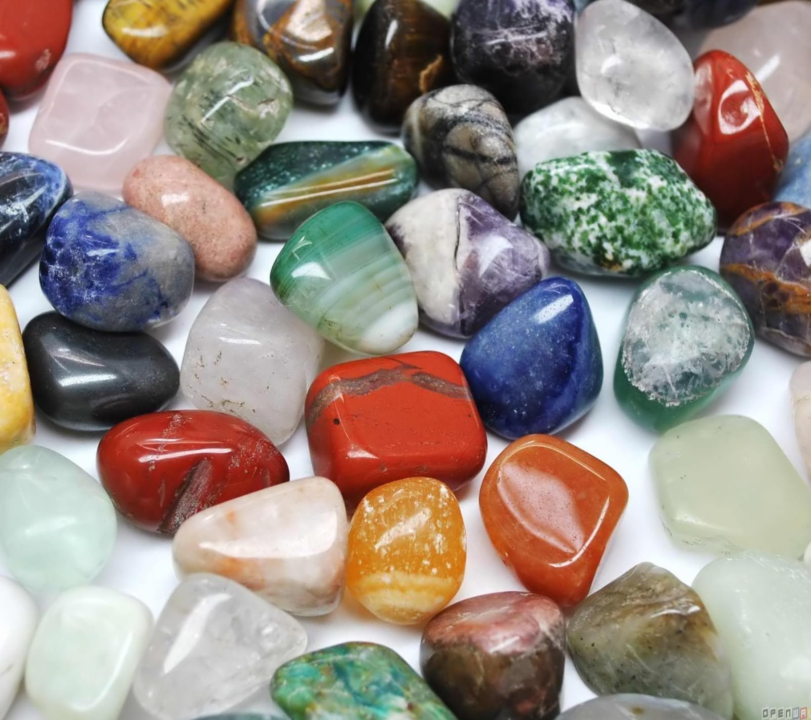 A close up of a pile of different colored rocks (abstract, art, colorful, colors, marble)