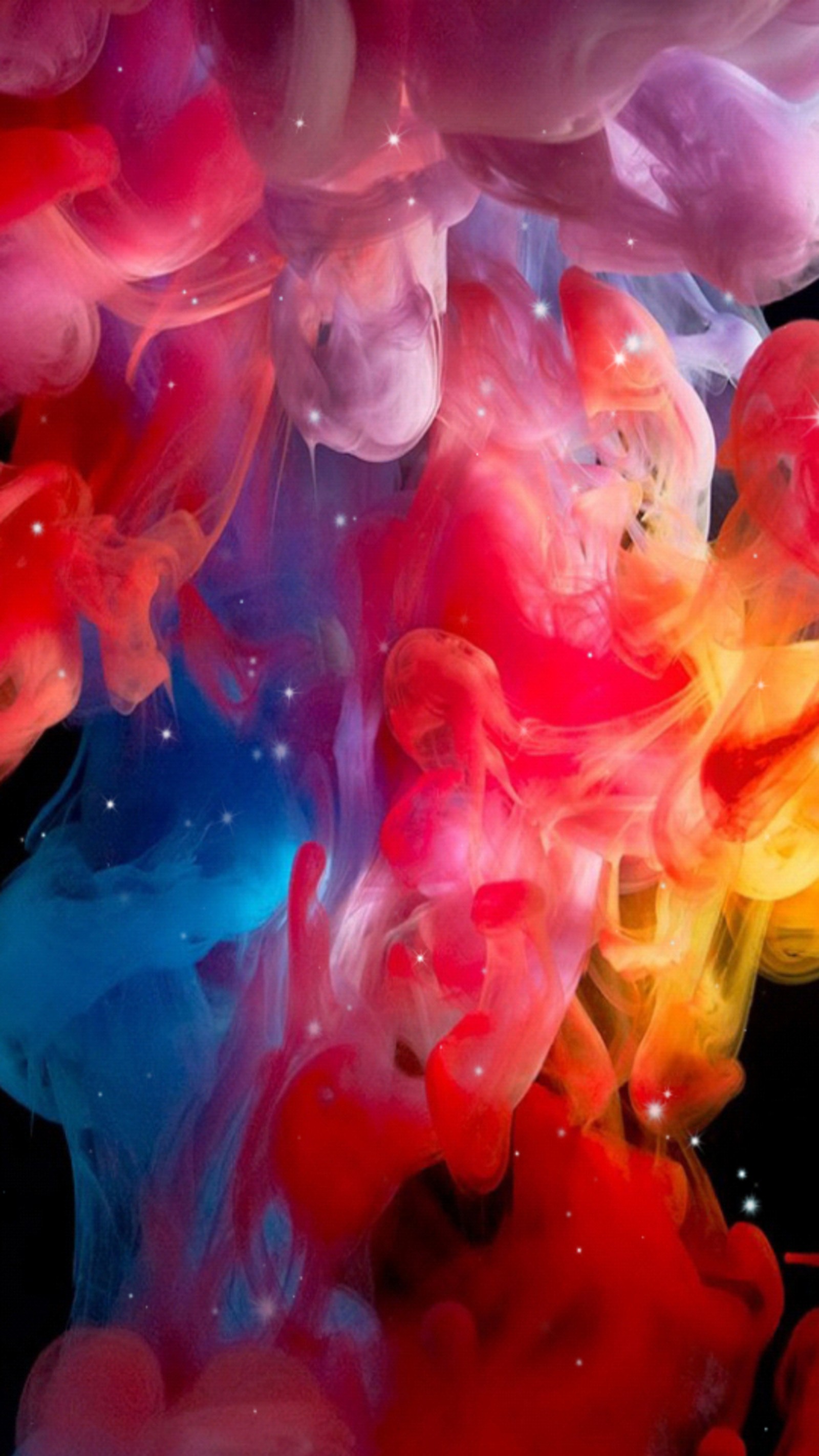 A close up of a colorful liquid substance in the water (colours, smoke)