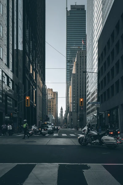 Urban Skyscrapers Framing a Bustling Street Scene