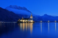 Twilight Reflection of Hallstatt's Landmark on Serene Lake