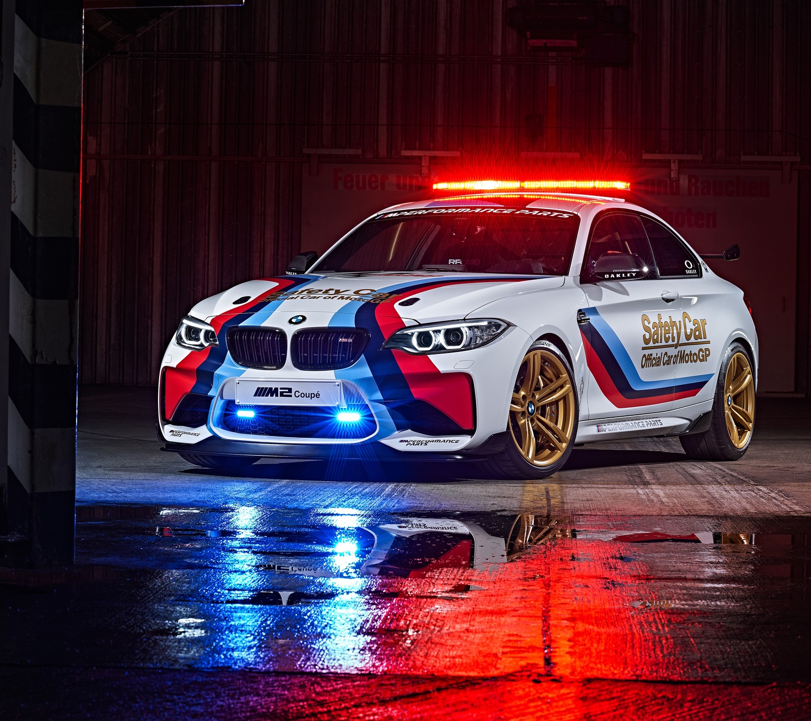 Bmw police car with lights on in a garage with a red and blue light (auto, bimmer, bmw, car, m2)