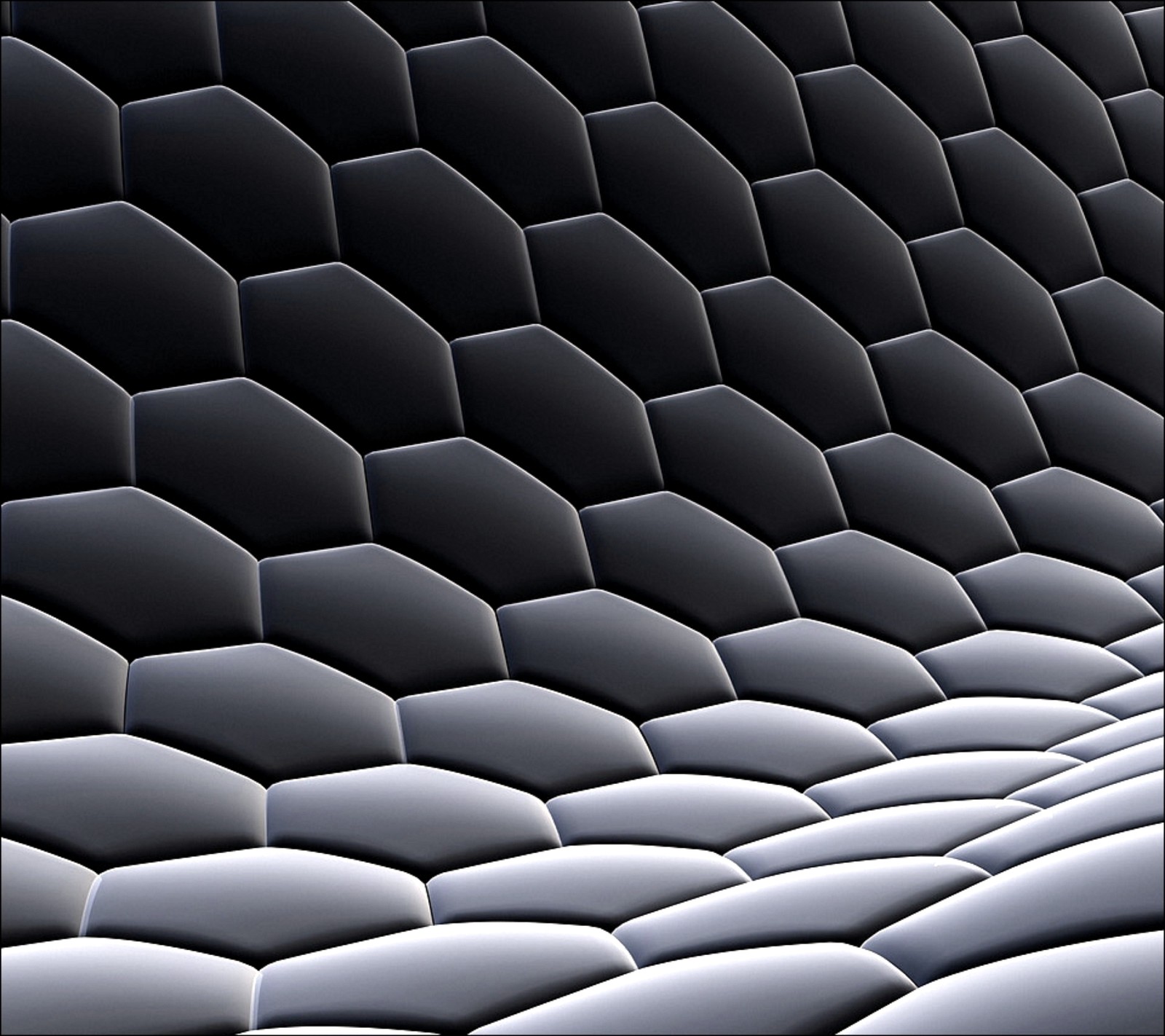 A close up of a black and white photo of a wall (3d, hexagons)