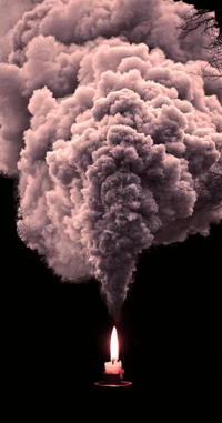 Illuminated Candle Surrounded by Billowing Clouds of Smoke