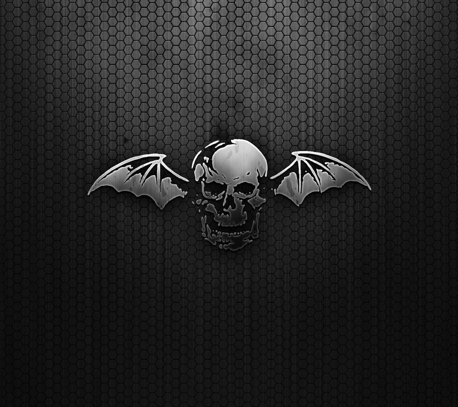 A black and white photo of a skull with wings on a black background (abstract, batman, black, design, logo)