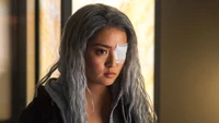 Rose Wilson with silver hair and a bandage over one eye, portraying a moment of intensity in Titans Season 2.