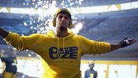 Celebratory Male Character in Yellow Hoodie at Video Game Finals