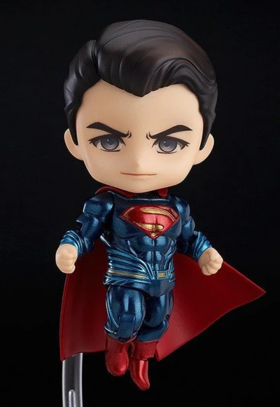 Pequena figura de ação do Superman em pose icônica