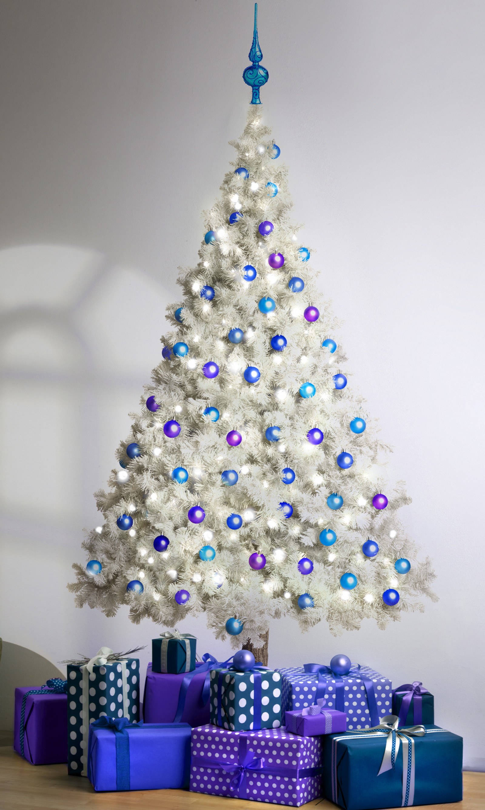 Arafed christmas tree with presents and a star on top (blue, christmas, presnts, santa, white)