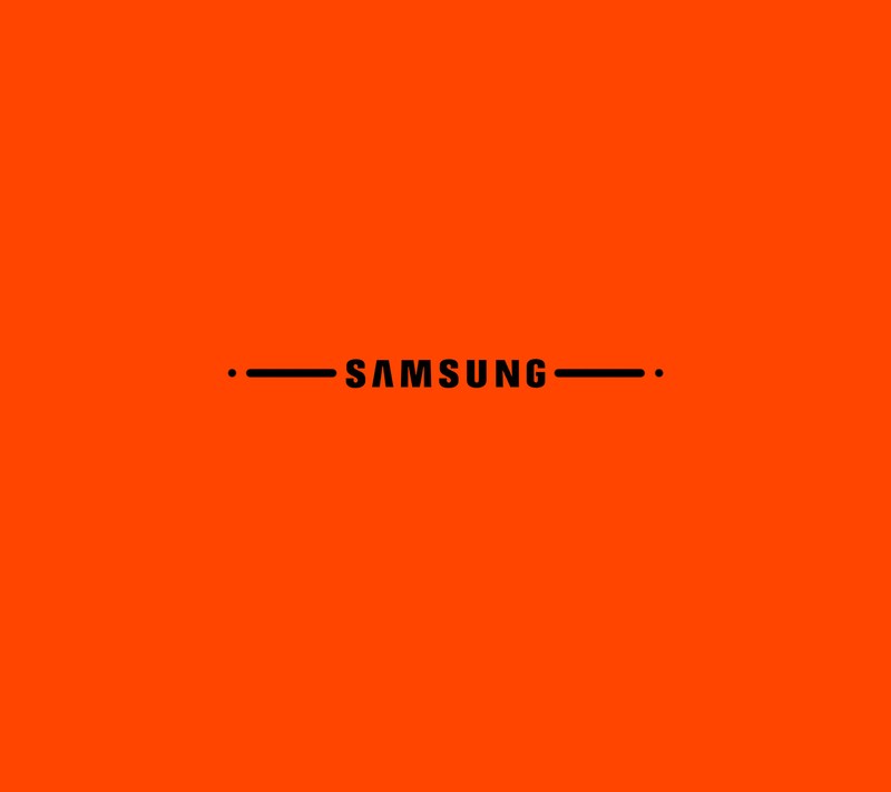 Близкий план логотипа samsung на оранжевом фоне (новый год 19, samsung, чёрный, оранжевый, галактика)