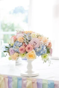 Ramo de flores en tonos pastel para una celebración de boda de ensueño