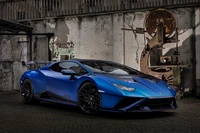 2023 Lamborghini Huracán STO Anniversary Edition in striking blue, showcasing sleek design and performance.