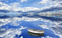 Serene Sunset Reflection: A Boat Adrift in a Sky of Clouds