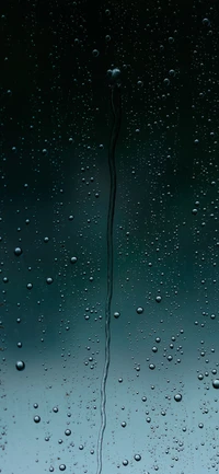 Electric Blue Raindrops on a Darkened Surface