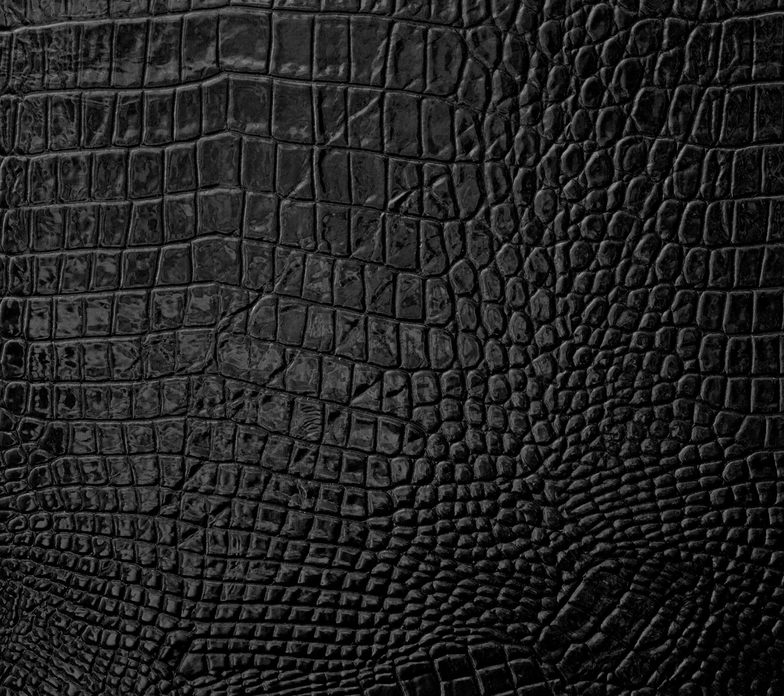 Gros plan d'une texture en cuir noir avec un motif (hd, cuir, texture)