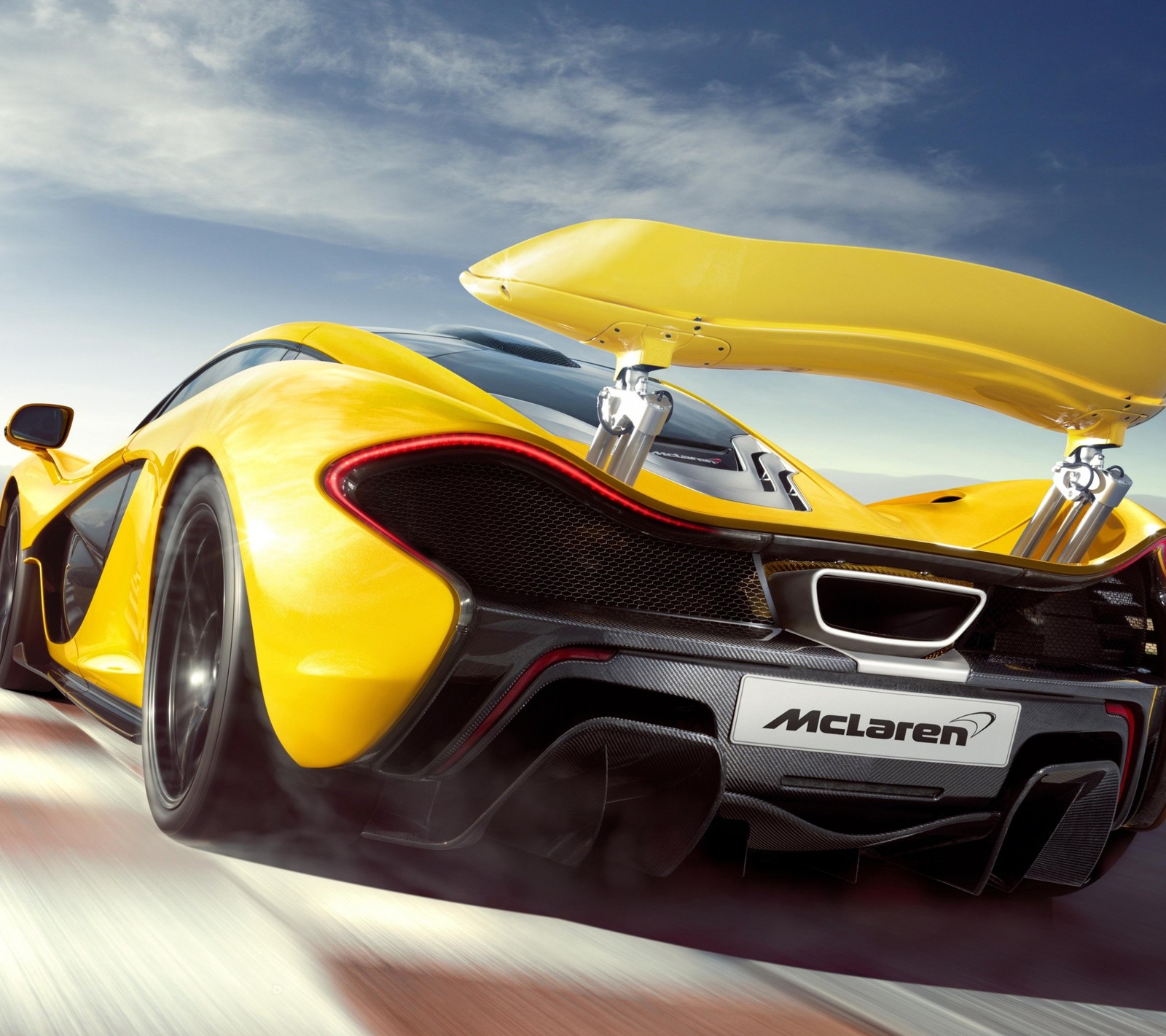 A yellow sports car driving on a track with its hood open (car, p1, race, road, sky)